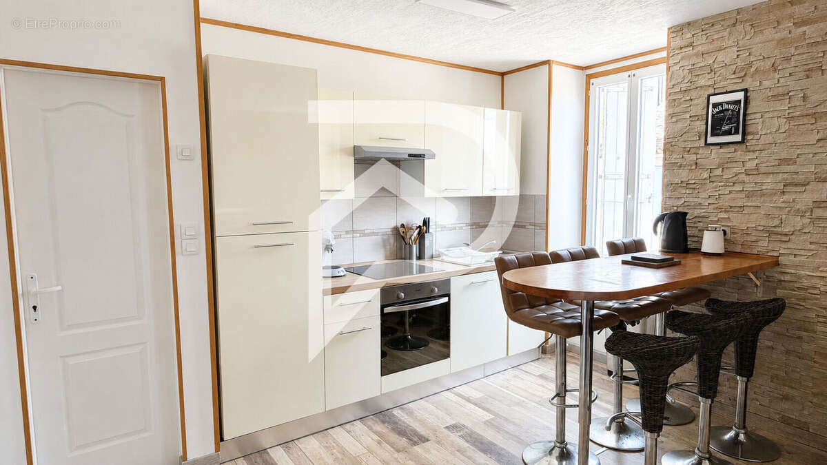 Appartement T2 rénové de 45 m² vendu loué Montredon-Labessonnié - photo 2
