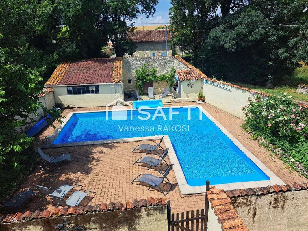 Photo 4 - Maison à SAINT-PIERRE-DE-JUILLERS