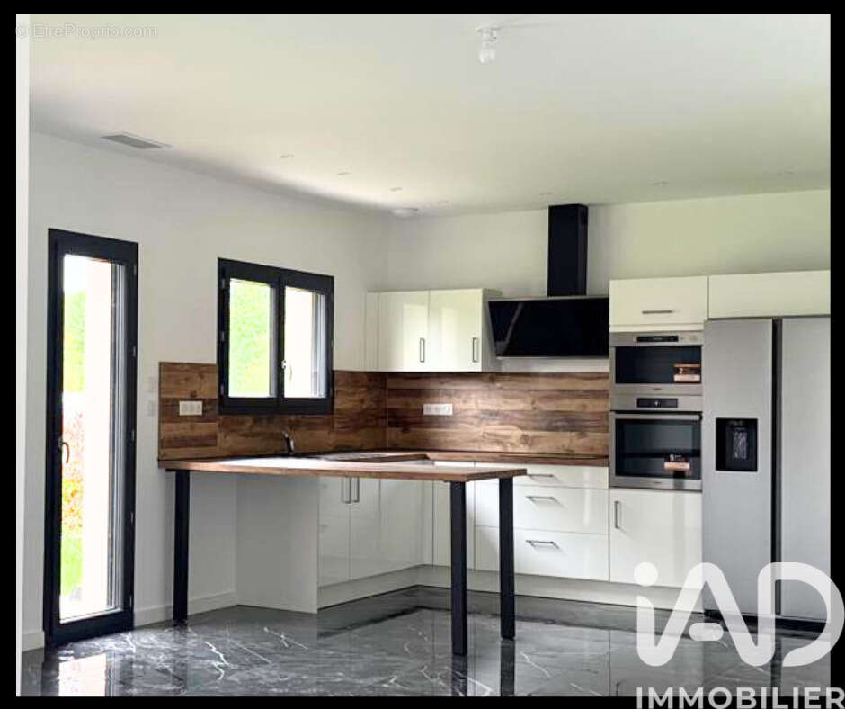 Photo 2 - Maison à LAUNAGUET