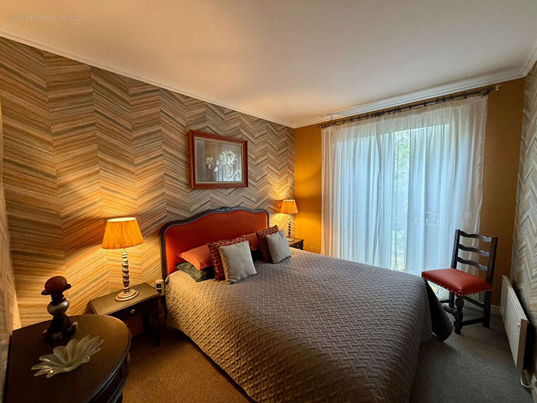 À l'abri des regards, maison chaleureuse où confort, intimité et douceur de vivre se rencontrent. - photo 10