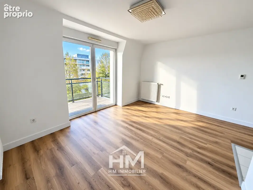 Rue Étienne Dolet  Exclusivité — Appartement en dernier étage avec balcon - photo 6