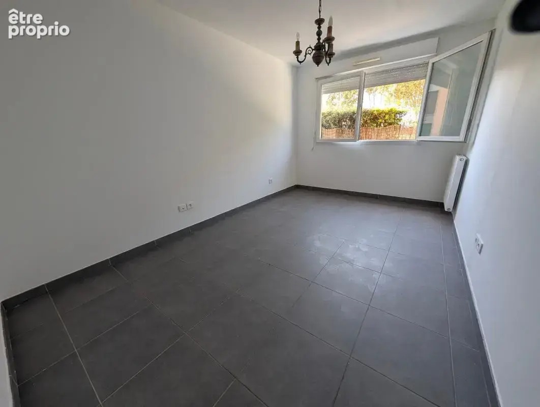 Appartement T3 RDJ avec parking centre ville au calme - photo 11