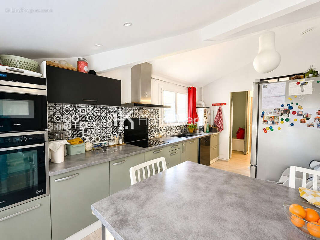 Maison 96 m² à Leguevin  - photo 2