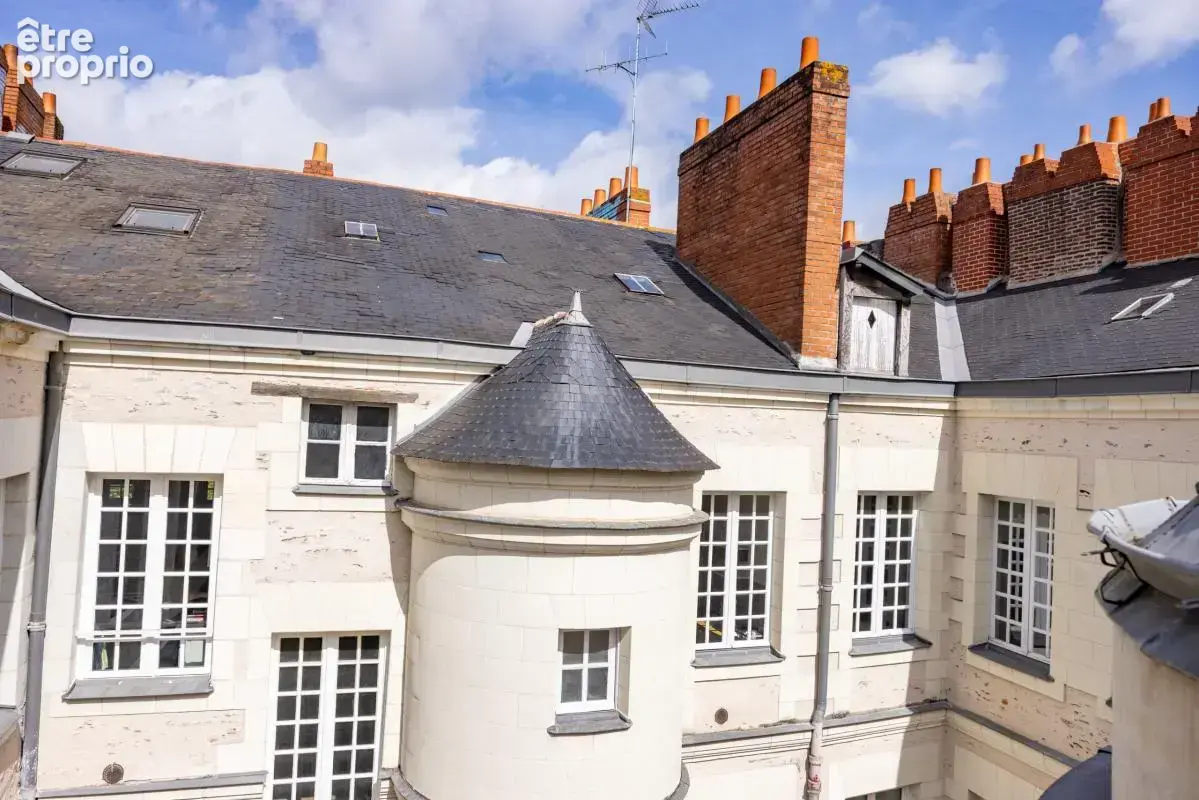 Appartement T4 atypique - photo 9