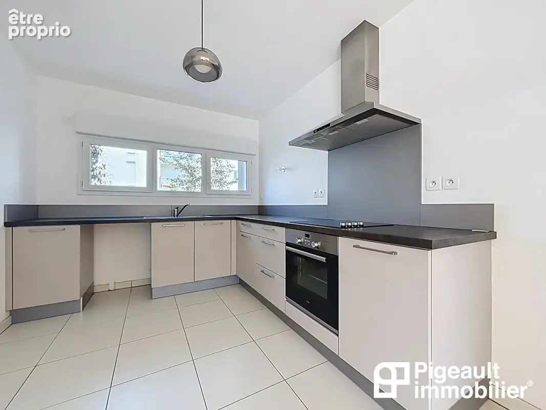 Maison - Appartement T4 en copropriété à vendre - Rennes - Quartier Lorient Saint-Brieuc - Double garage - Terrasse - photo 3