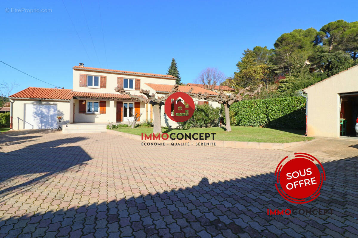 Maison à LAUDUN-L&#039;ARDOISE