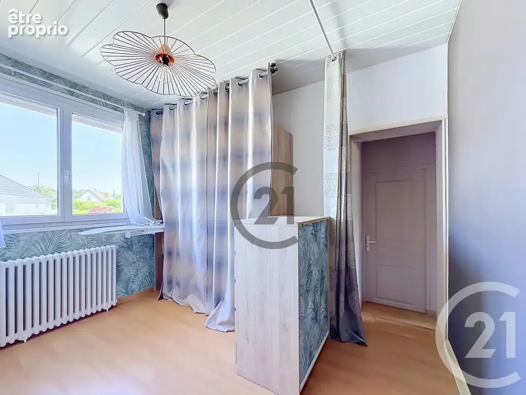 Maison 125 m² à Saint-Julien-Les-Villas  - photo 7