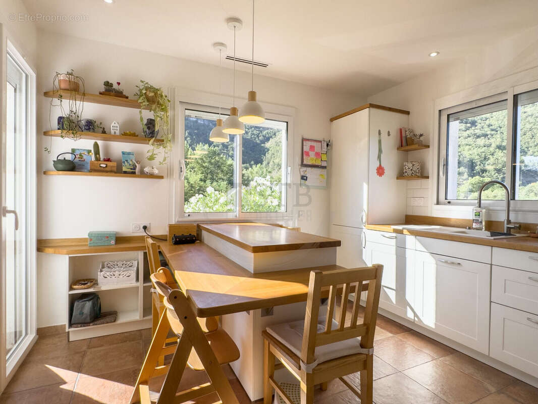 Maison 98 m² à Saint-Julien-En-Saint-Alban  - photo 8