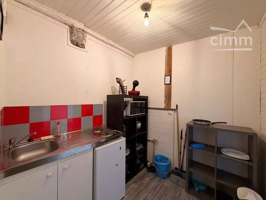 Immeuble de rapport avec local commercial loué et deux appartements - photo 7