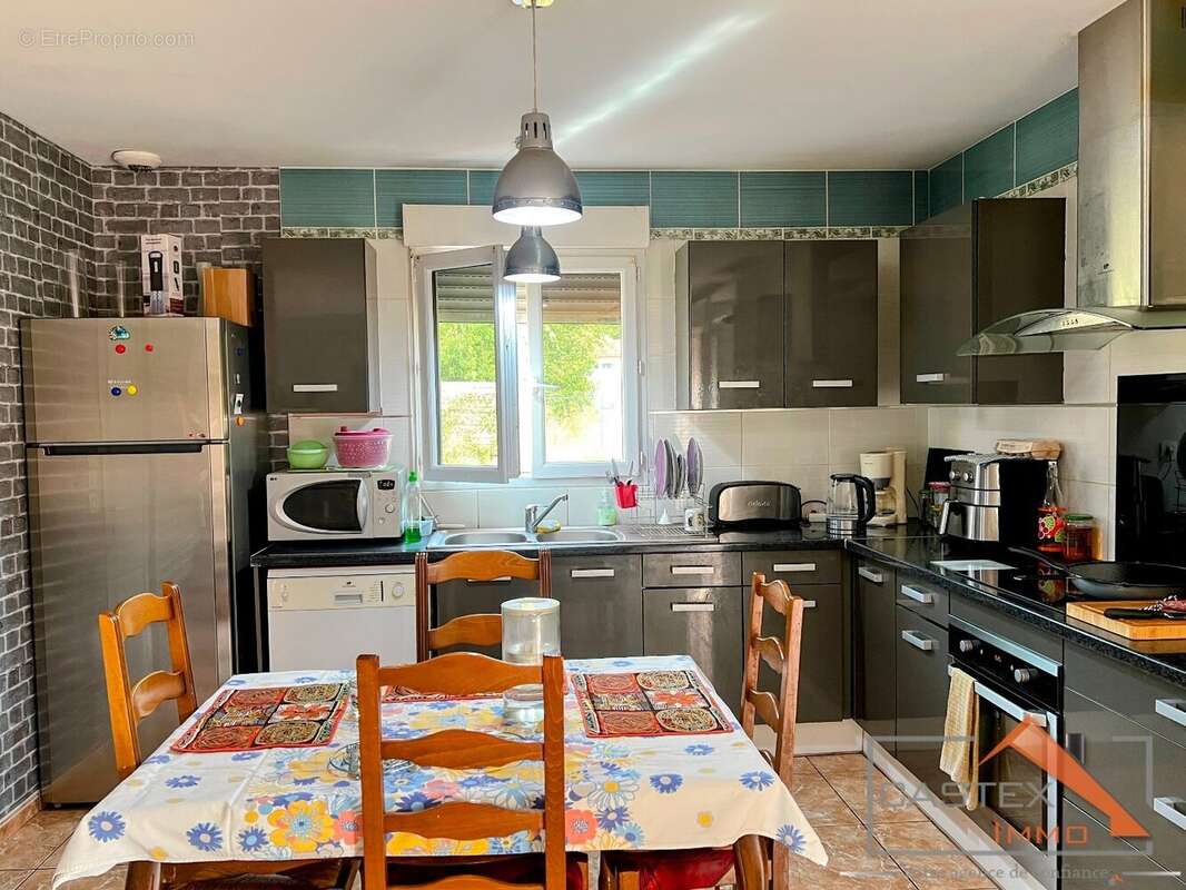 Exclusivité  Maison familiale de plain-pied avec 4 chambres - photo 4