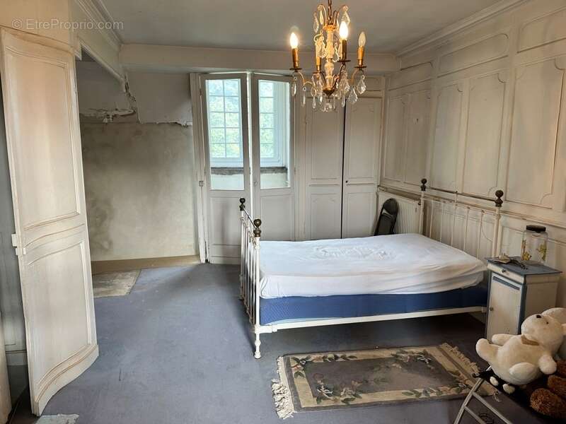 Maison à SAINT-OUEN-DE-THOUBERVILLE