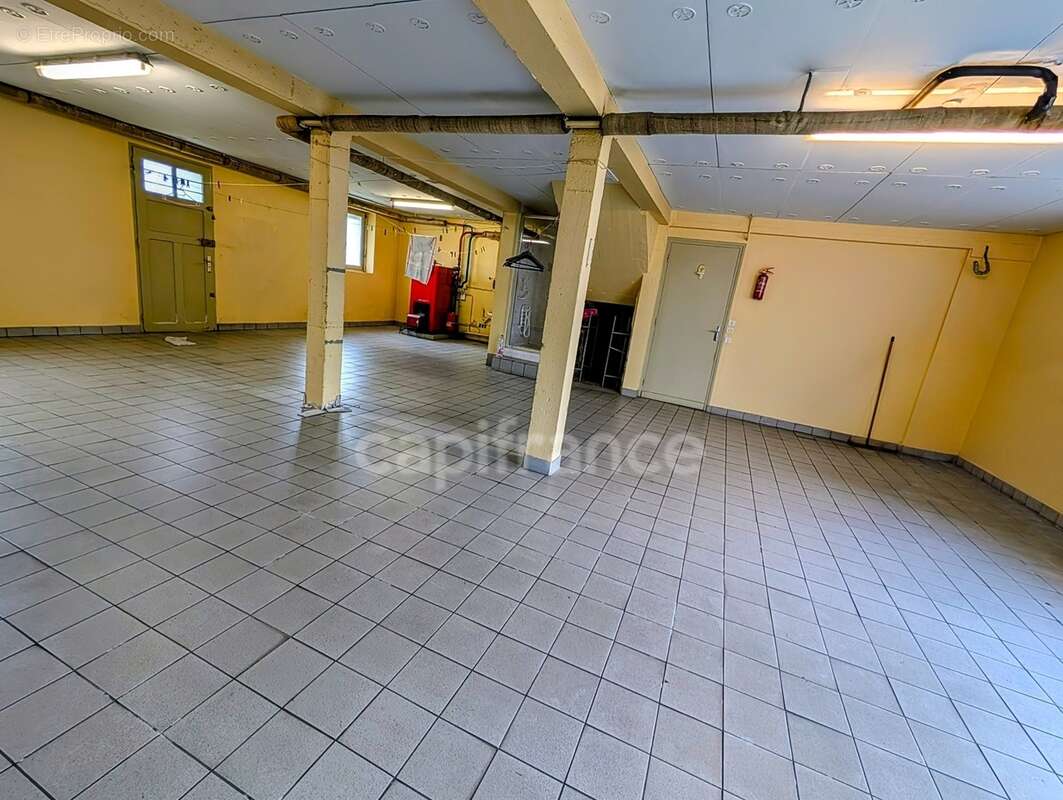 Maison en impasse dans quartier résidentiel, rez de chaussée à aménager, grand garage, à GUIPAVAS (29) - photo 15