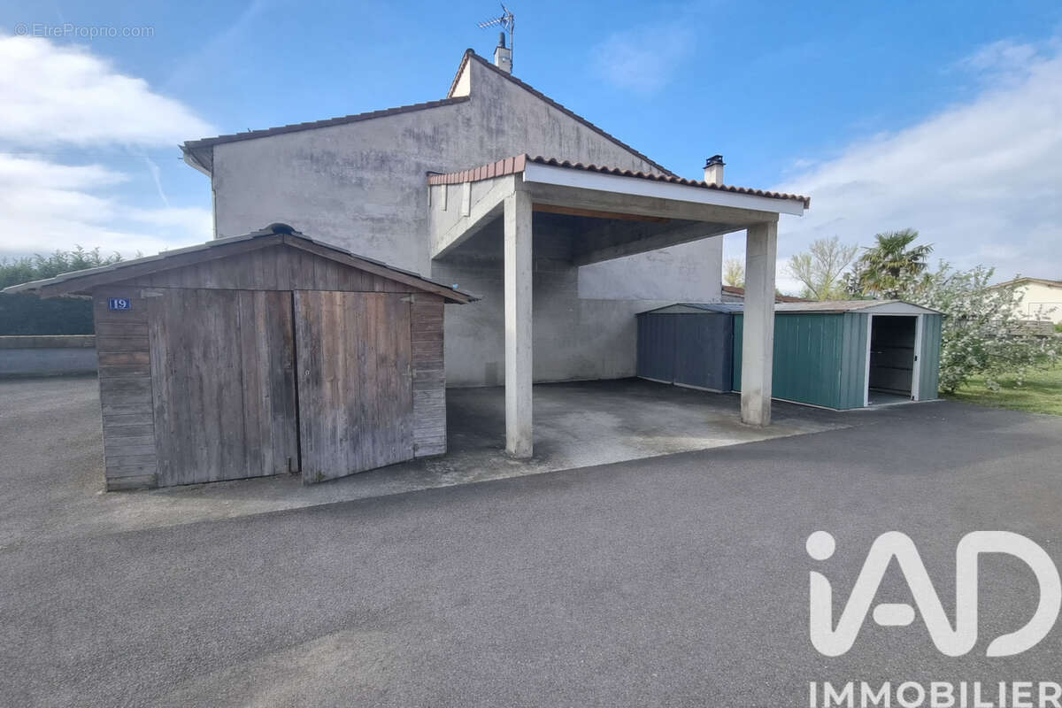 Photo 3 - Maison à ANDREZIEUX-BOUTHEON