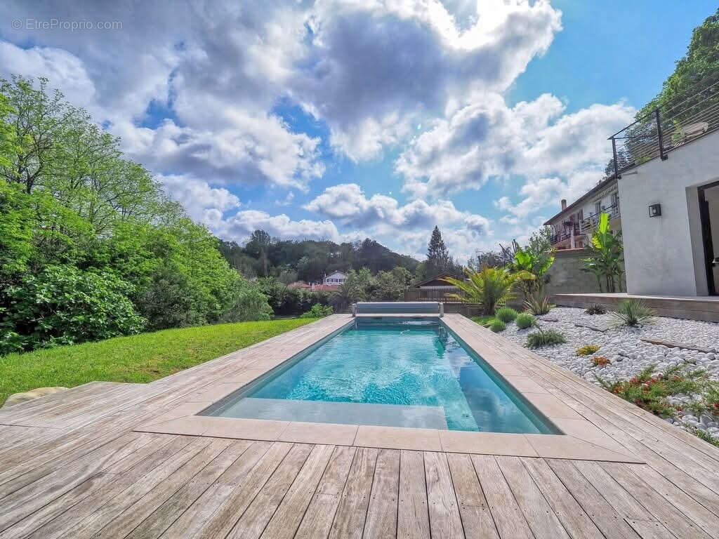 Une propriété d'architecte d'exception au cœur d'un environnement privilégié - photo 3