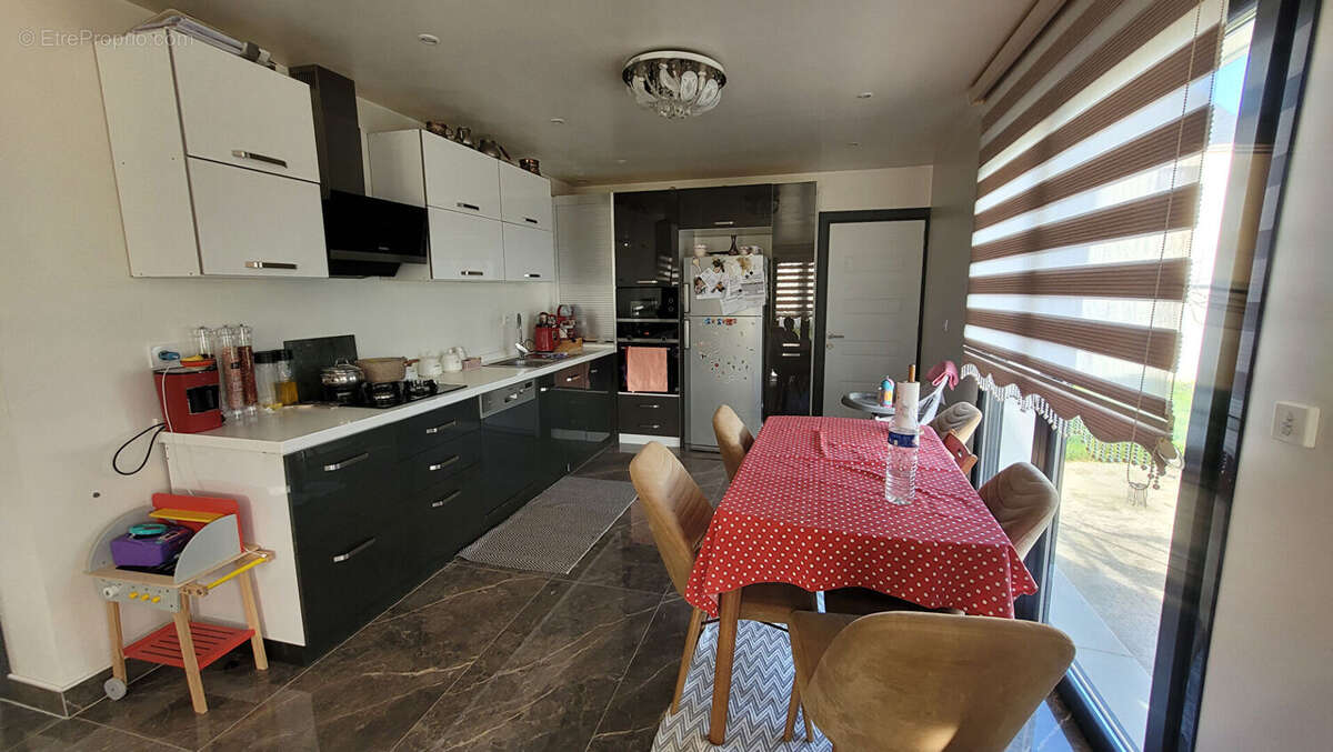 Maison à CORMELLES-LE-ROYAL