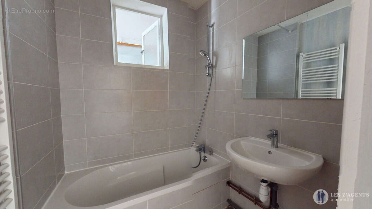 T3 avec balcon dans une copropriété fermée - photo 10