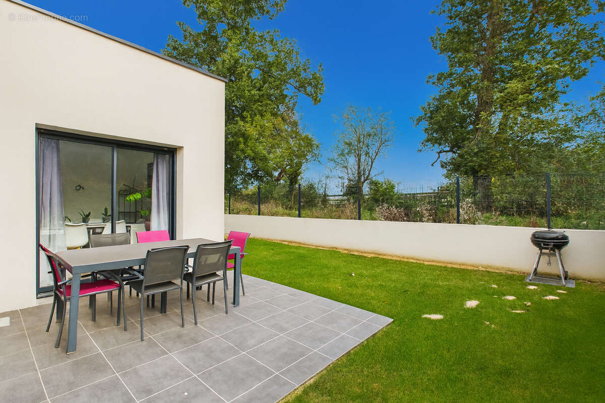 MAISON CONTEMPORAINE RT2020 5 pièce(s) 136 m2 ur 580m² terrain ROMANS SUR ISERE 26100 - photo 18