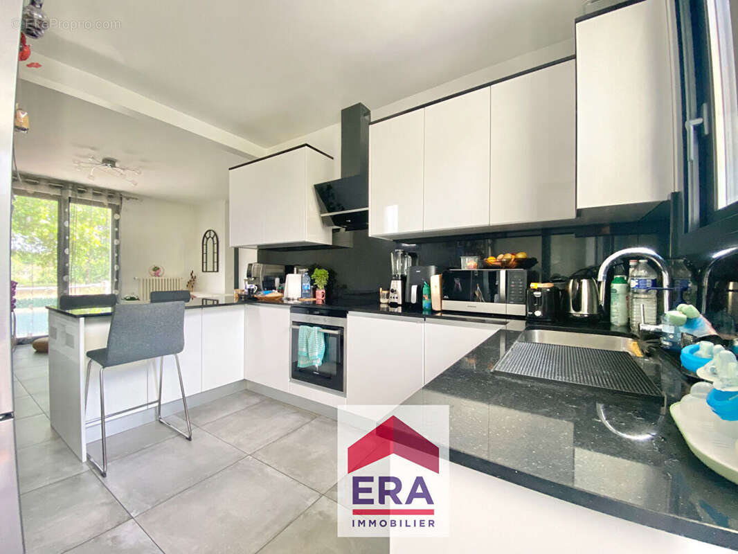 Maison à SARTROUVILLE