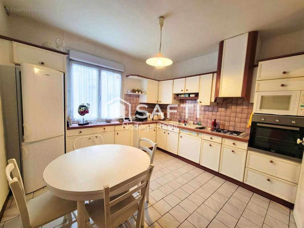 Photo 3 - Maison à SEICHES-SUR-LE-LOIR