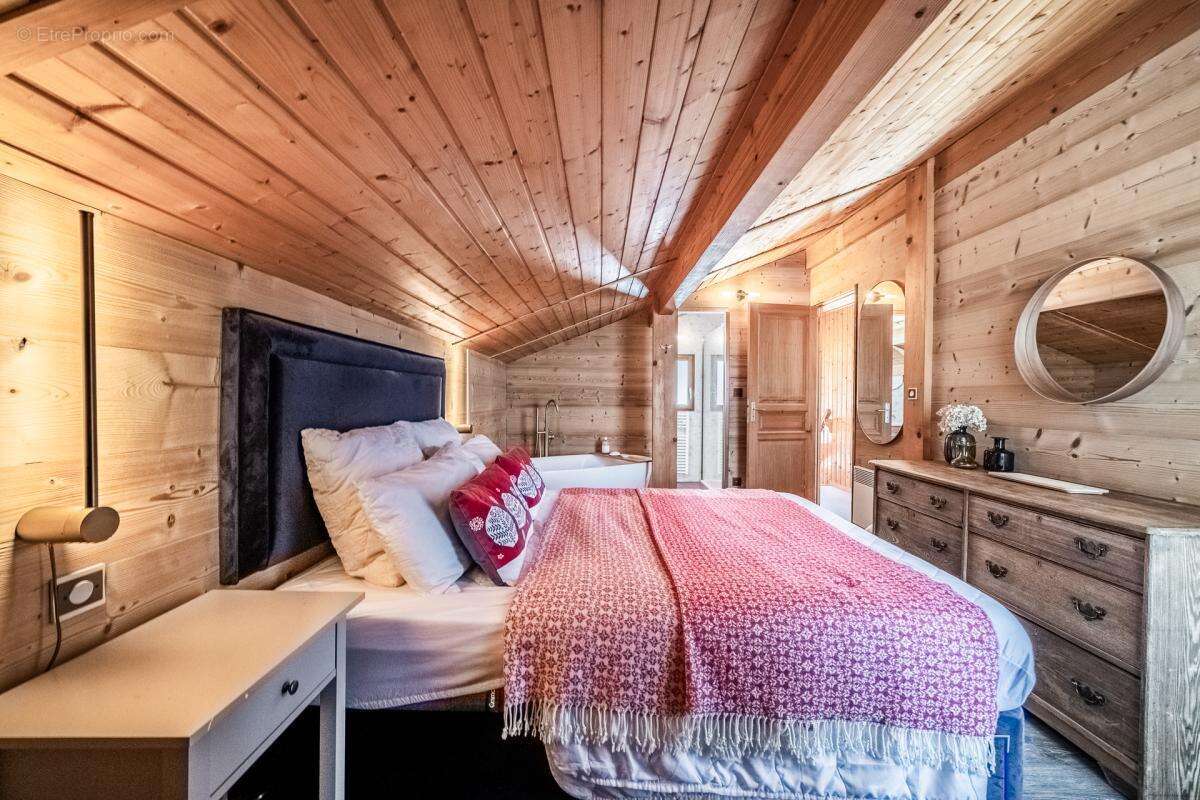 Un chalet alpin magnifiquement aménagé offrant une vue panoramique, idéalement situé à Chavannes - photo 16