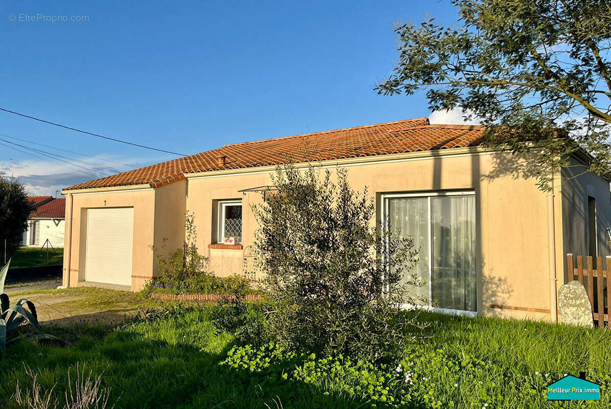 Maison de plain-pied avec 3 chambres et garage attenant - photo 9