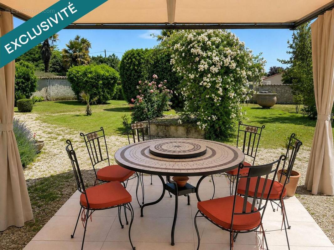 Photo 1 - Maison à LOUZAC-SAINT-ANDRE