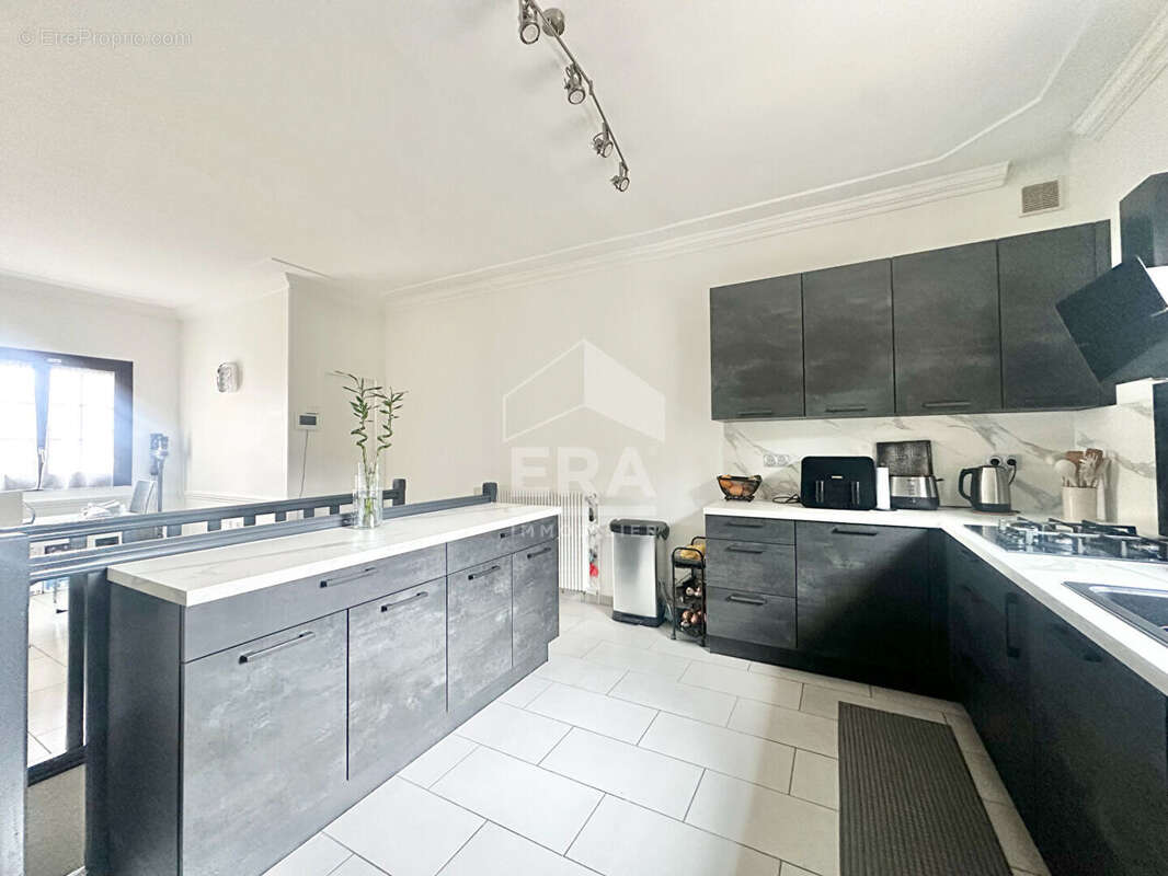 Maison à SARTROUVILLE