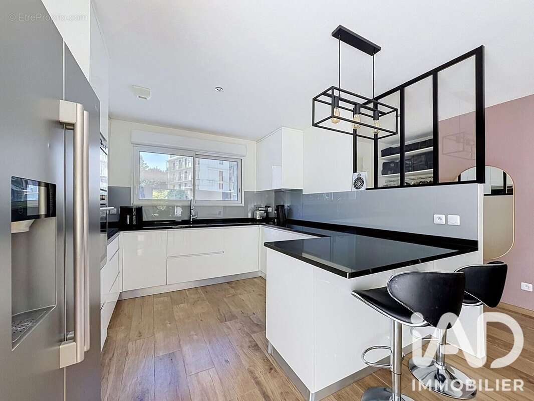 Maison 128 m² à Le Plessis-Bouchard  - photo 5