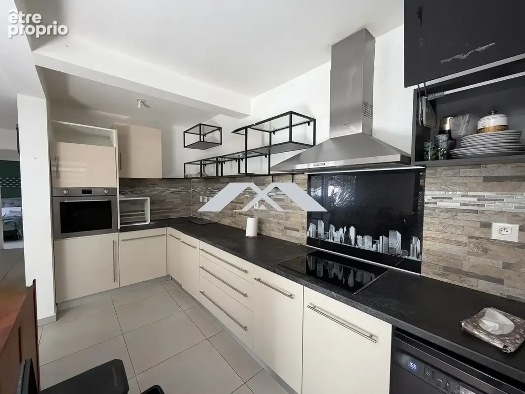 Maison 5 pièces 114 m² à vendre à Saint-Pierre (97410) - photo 4