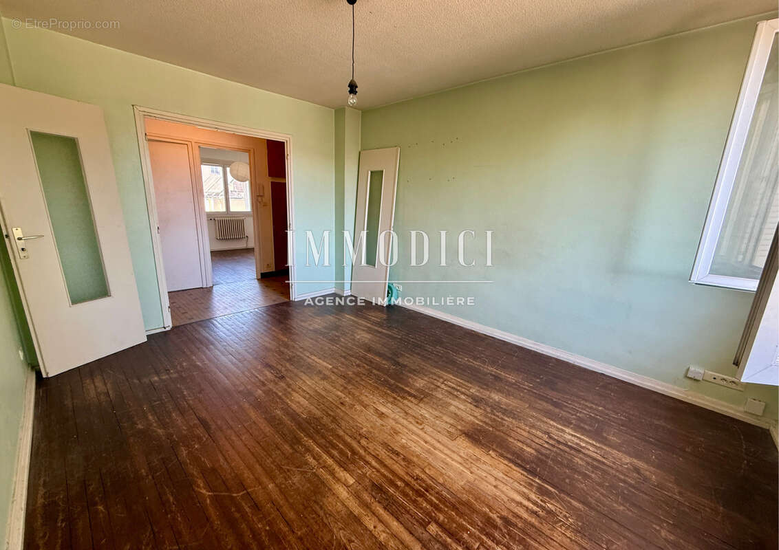 T3 traversant de 52 m2 au cœur du quartier États-Unis - 2ᵉ étage d'une copropriété - photo 10