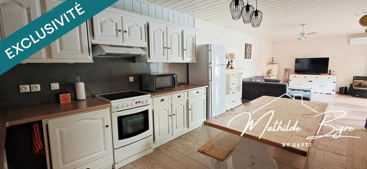 Photo 1 - Maison à LE BREUIL-SUR-COUZE