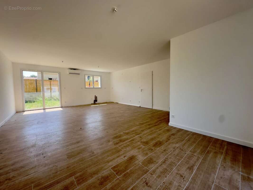Maison de plain-pied T4 de 98 m² - photo 2