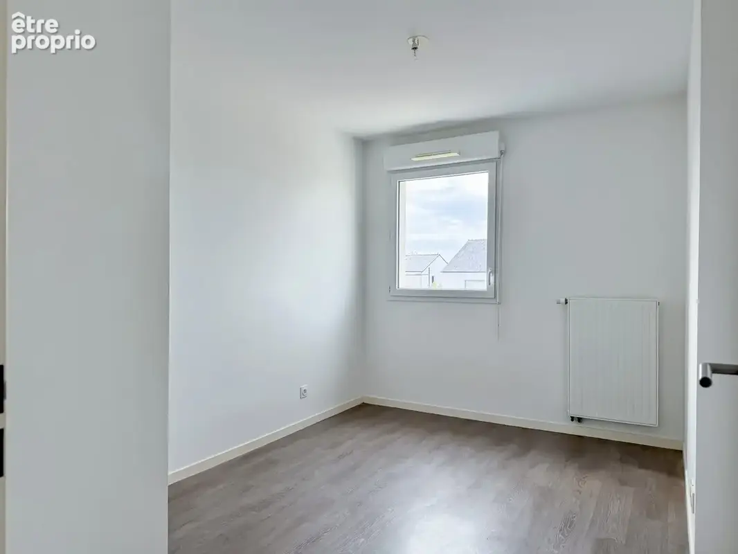 APPARTEMENT T3 COUËRON - 64 m2   Balcon, 2 parkings & local vélo privatif - photo 8