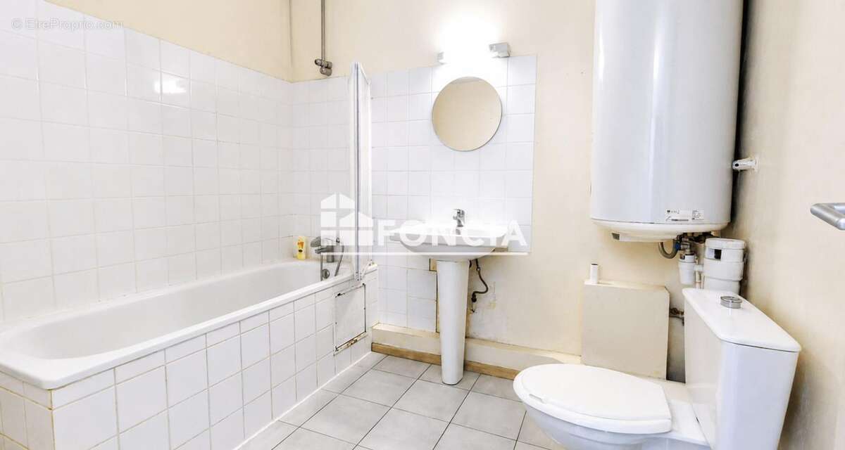 CHÂTEAU-THIERRY – Duplex T4 avec parking sécurisé et cave - photo 5
