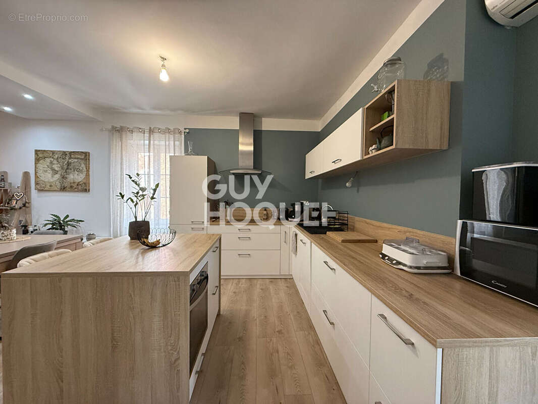 Appartement T2 Bis possibilité T3 au centre  d'Echalas de 73.27 m2 - photo 5