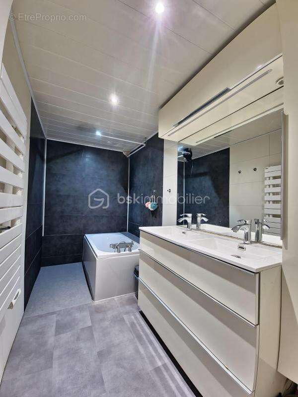 Appartement en rc de 124m² utile avec terrasse de 34m² -vue degagee- 5p lumineux et en parfait etat - photo 11