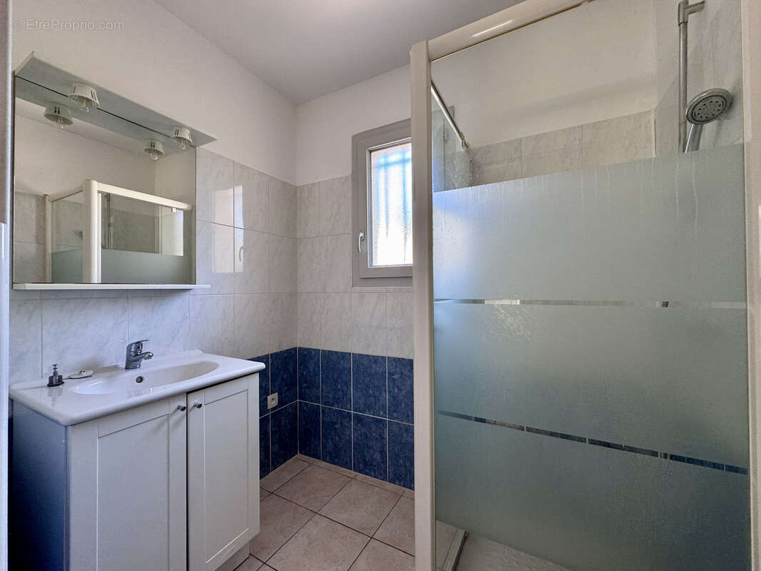 Appartement récent en rez-de-jardin - photo 6