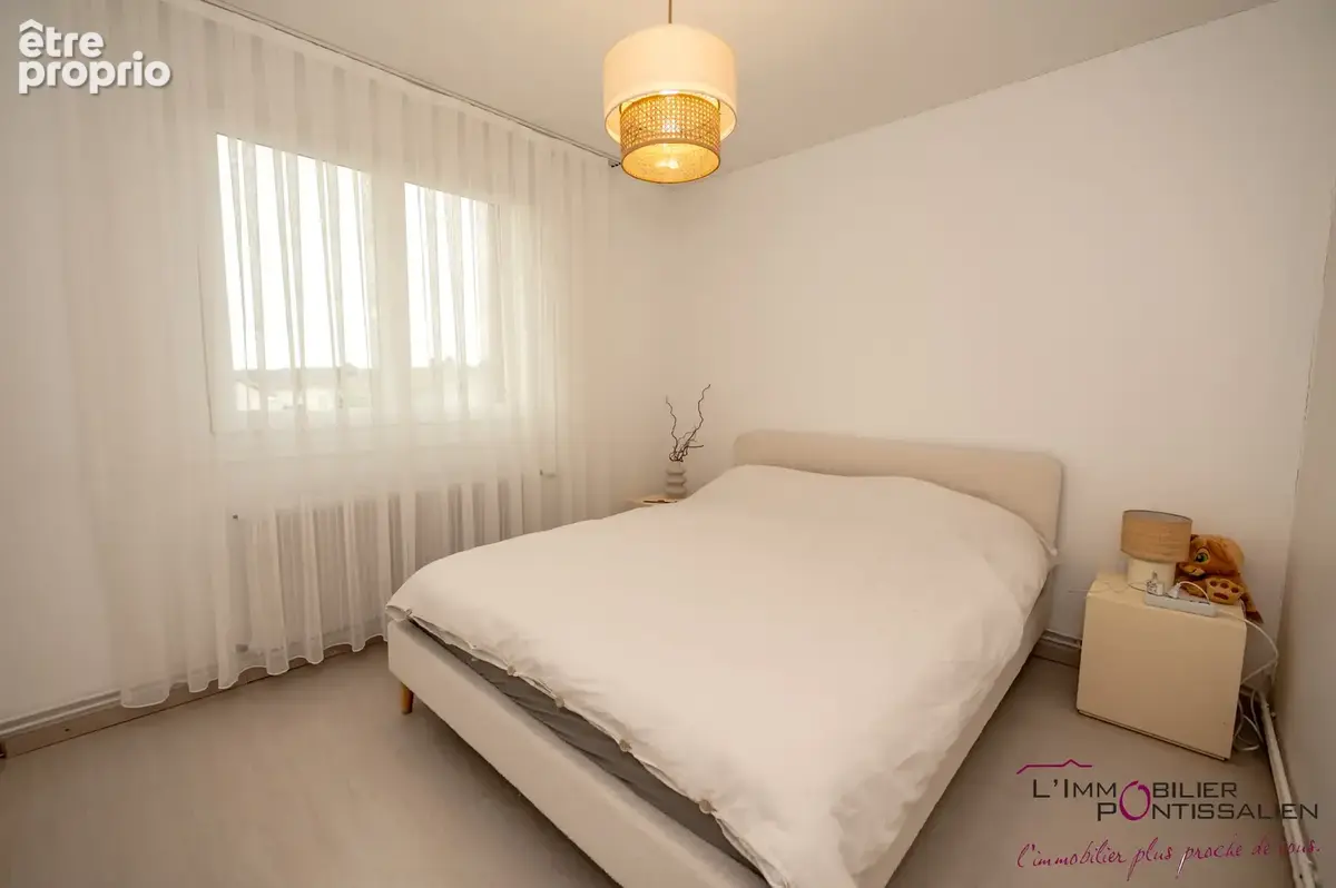 Pontarlier - proximité centre ville : t3, 2 chambres, cave et parking - photo 4