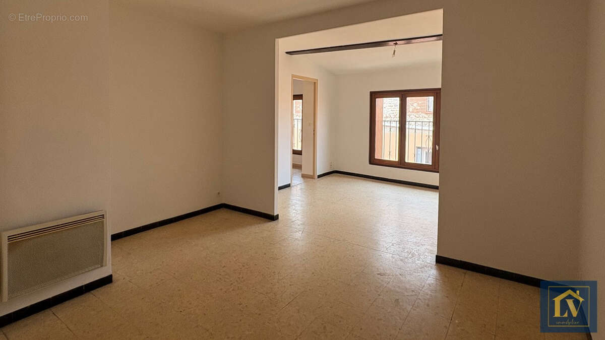 Immeuble de rapport comprenant un local commercial et 4 appartements - photo 10