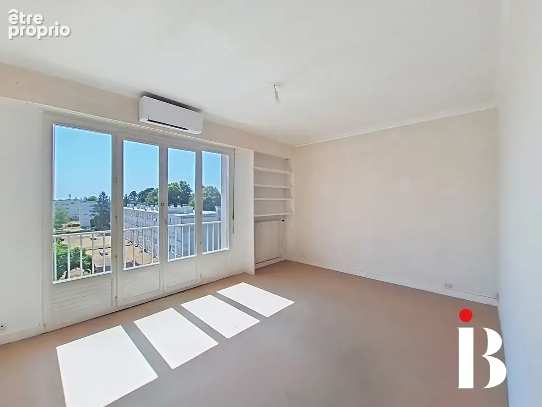 Appartement T4 de 102 m² Dernier étage Quartier Beauséjour - photo 5