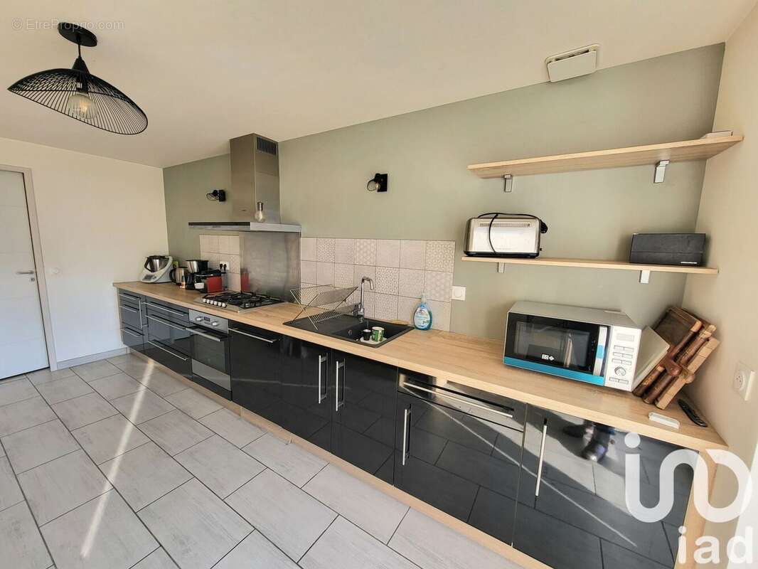 Photo 3 - Maison à ANDREZIEUX-BOUTHEON