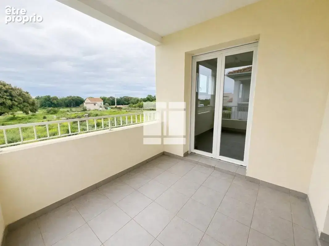Appartement T2 de 41 m² avec terrasse et parking - photo 7