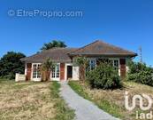 Photo 1 - Maison à BEAULON