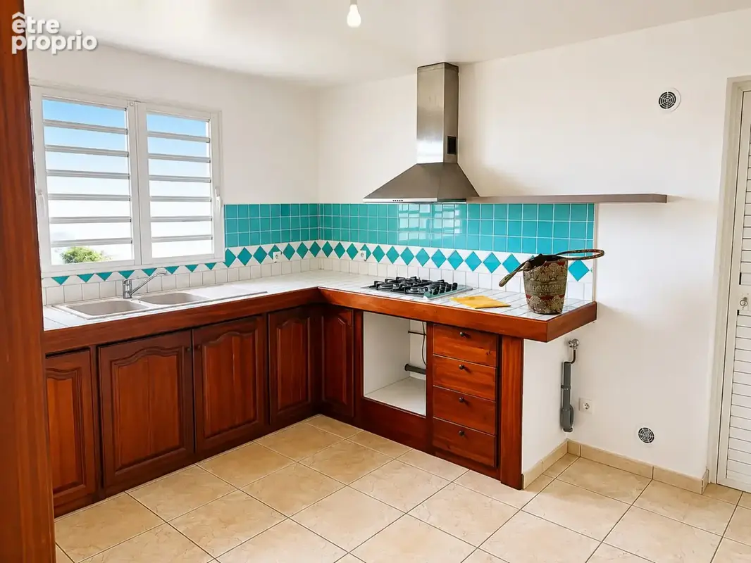 Maison 4 pièces 95 m² à vendre à Saint-Andre (97440) - photo 7