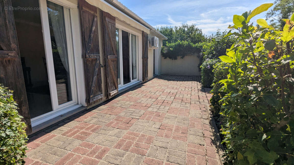 Maison de plain-pied 128 m² avec jardin à Val-de-Reuil 4 chambres - photo 11
