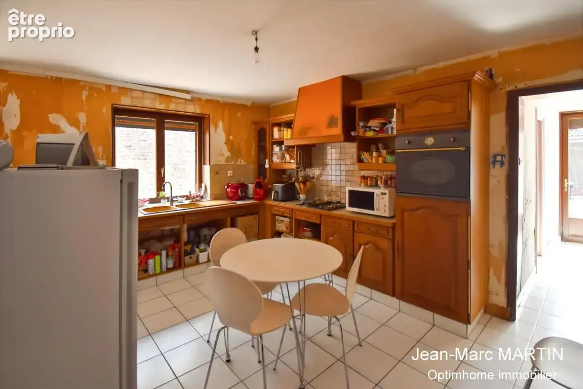 Maison familiale de 115 m² à Carnin : luminosité, 3 chambres et potentiel de valorisation - photo 16