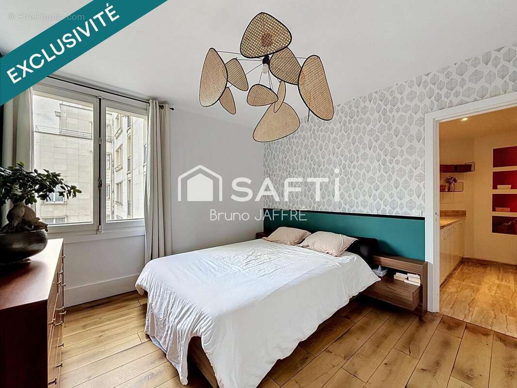 Photo 9 - Appartement à PARIS-17E