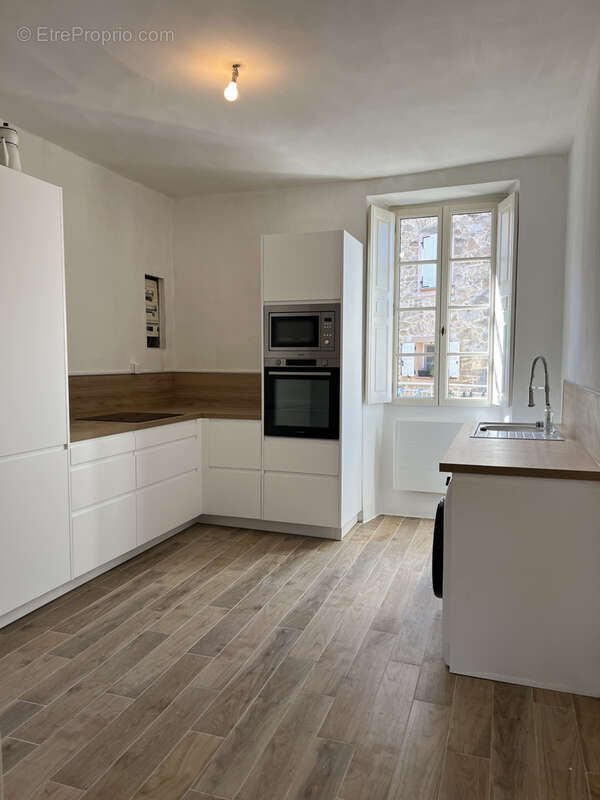 Appartement T3 74m2 centre village - photo 2