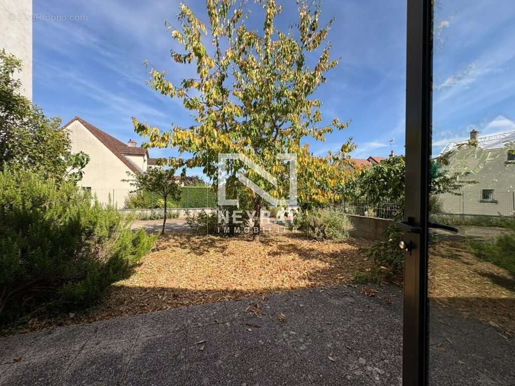 Appartement en rez-de-jardin avec garage - Vieux Chenove - photo 2