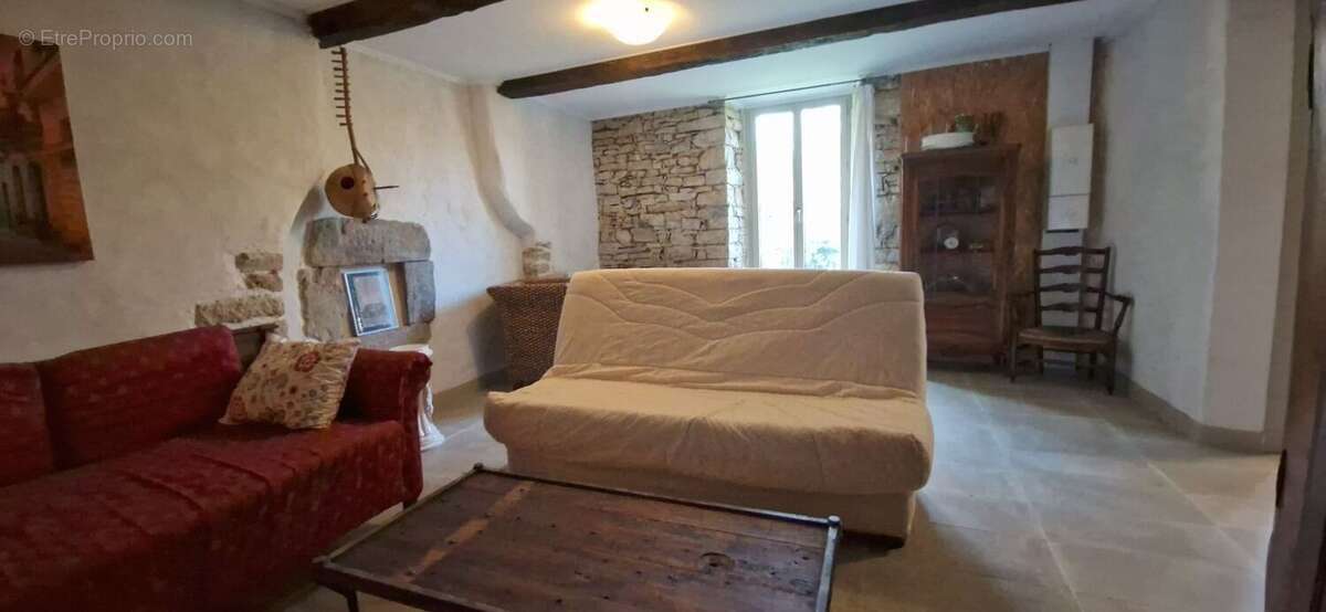 20251208155637 - Maison à AURIGNAC